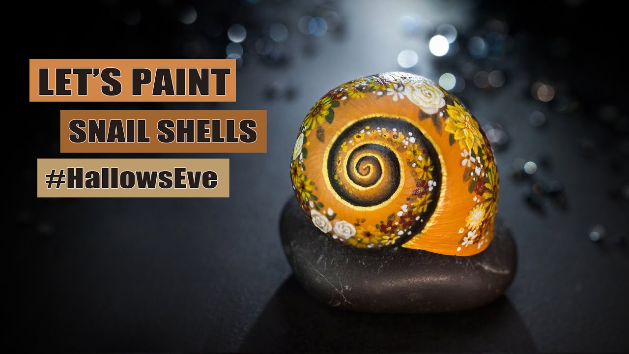 Autumn-colored painting on a large snail shell