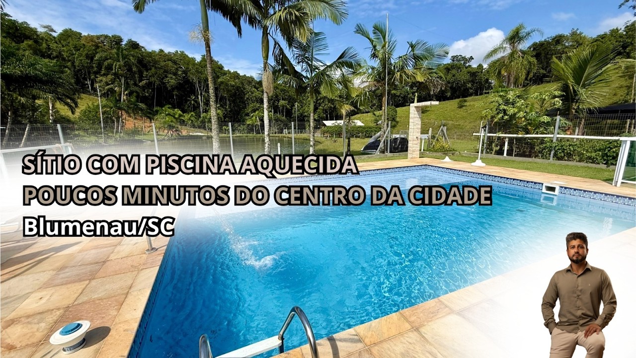 Sítio com piscina aquecida em Blumenau | Infraestrutura completa com lagoa e casa de alto padrão