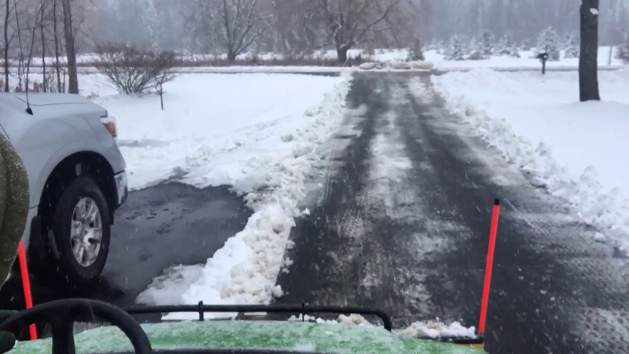 John Deere Gator snowplowing wet heavy snow!