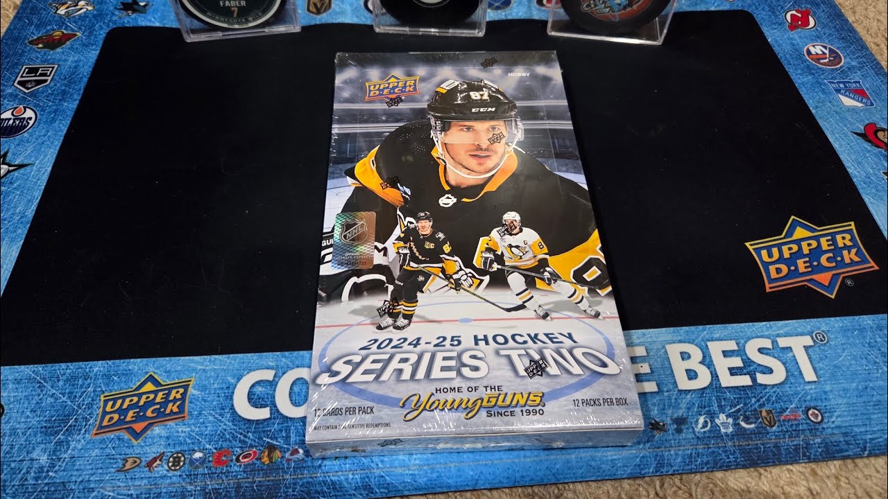 2024-25 UD Series 2 Hockey Hobby Box Battle с карточками «За тягу» и «Страдающий свободой»