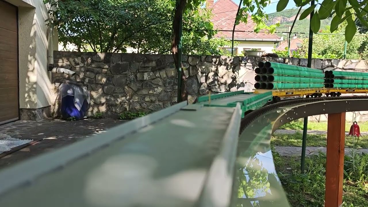 Riding along my G scale loop behind a USA Trains GP38-2 loco equipped with ESU LokSound