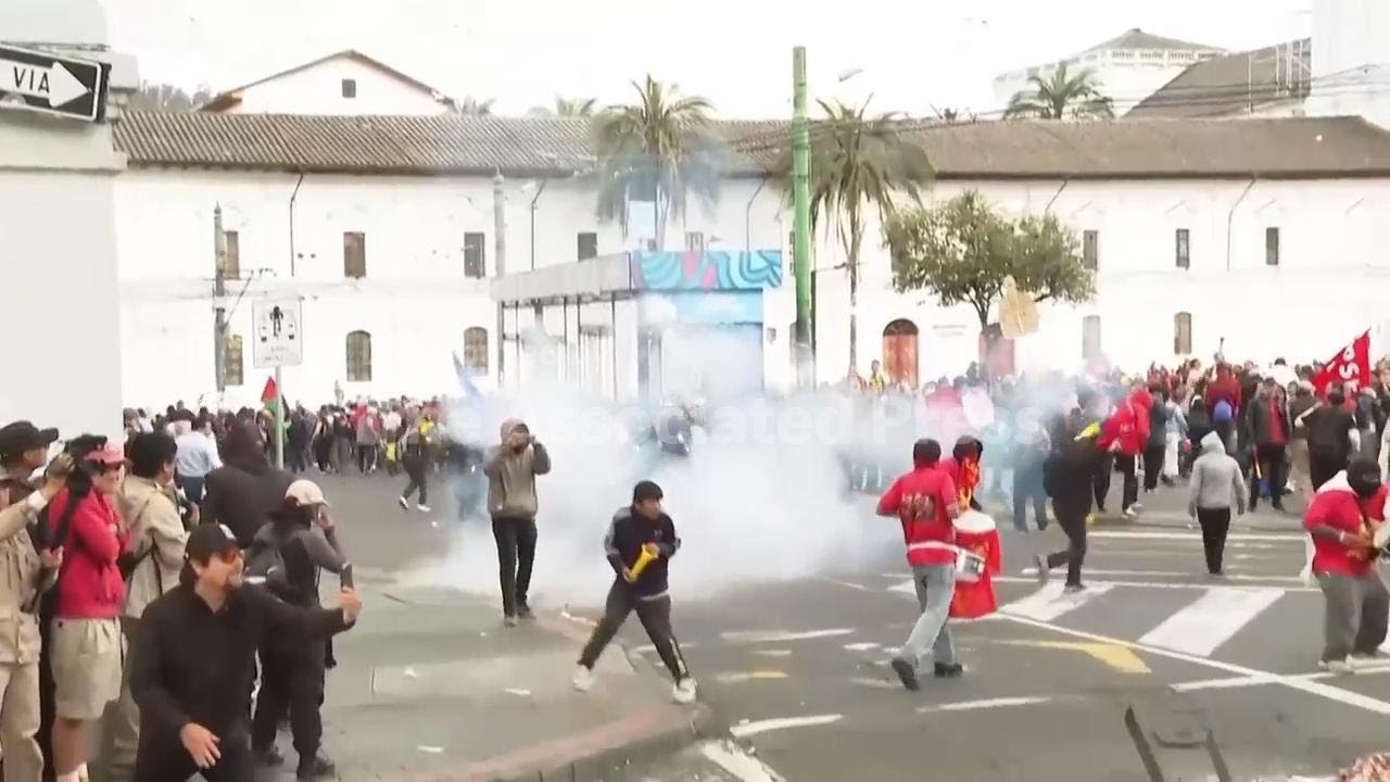 Police fire tear gas during protest against labor reform in Ecuador