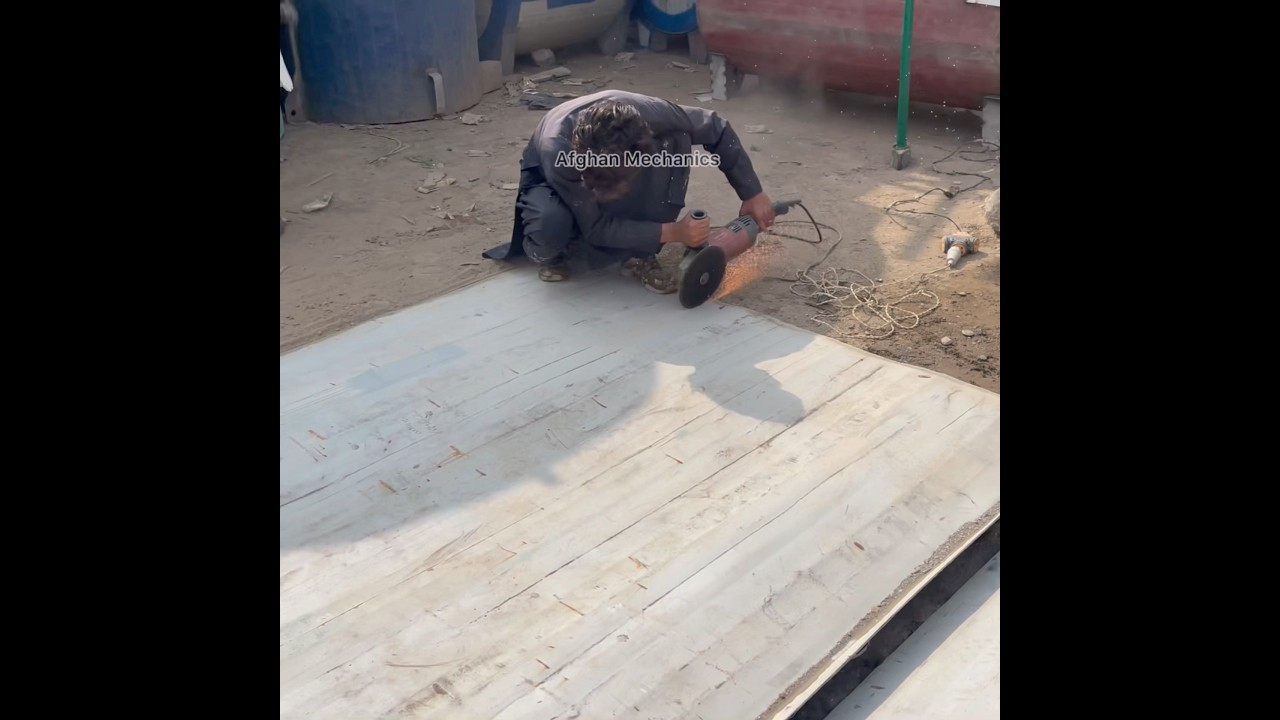 Man Making Water Tank From Container