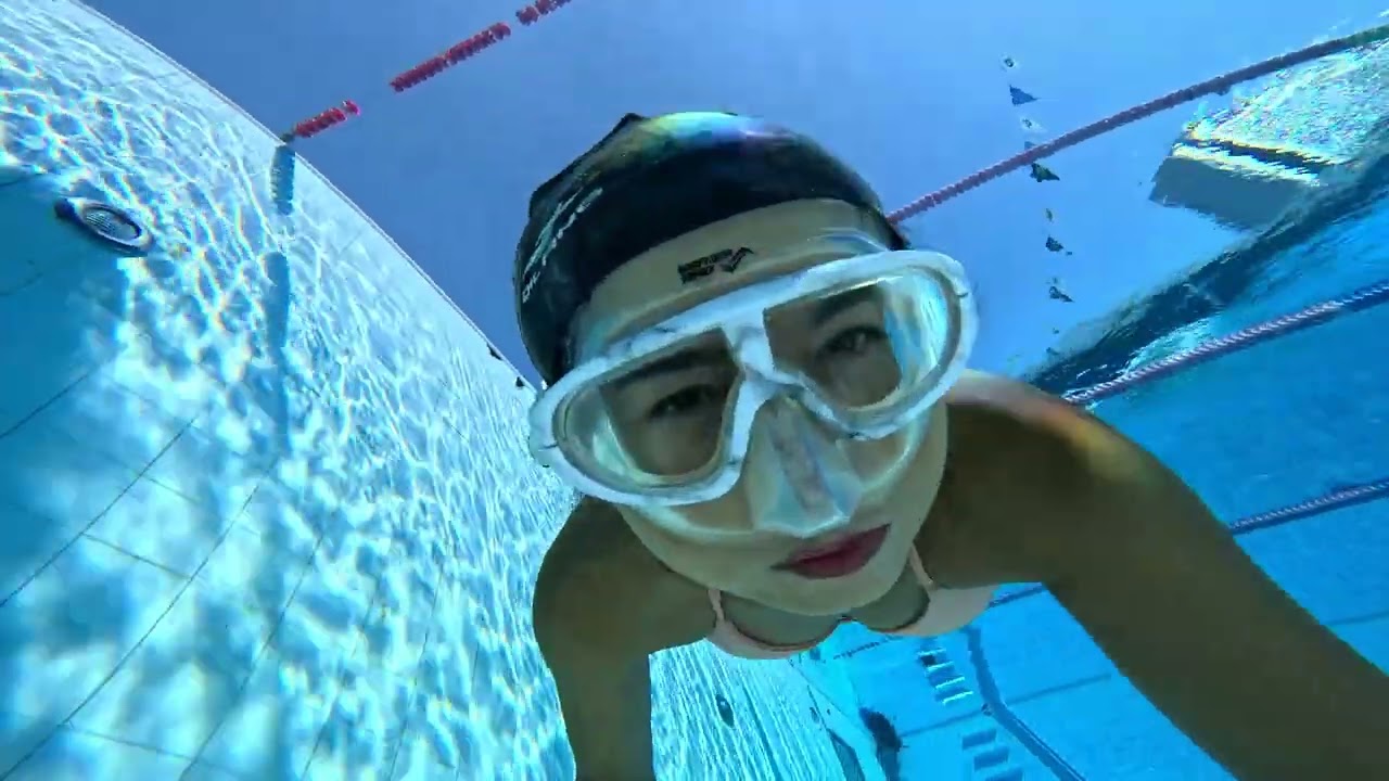 Submerged in tranquility, I hold my breath beneath the surface.