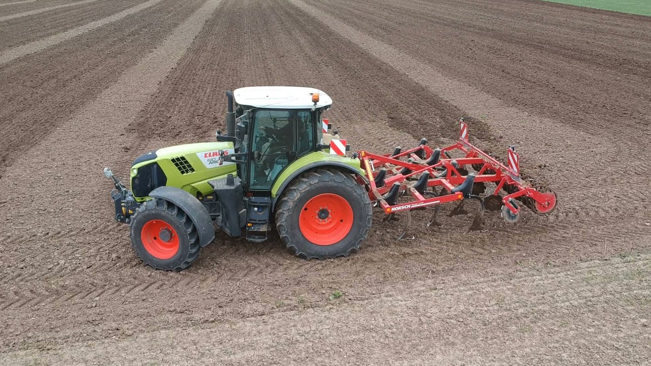 Claas Arion 610 mit Horsch Terrano 3FX Maisland vorbereiten