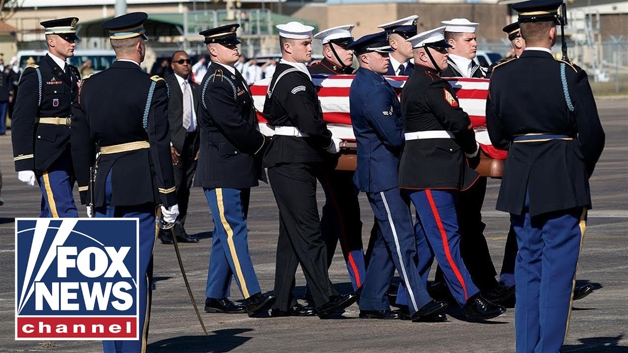 George H.W. Bush's casket departs Joint Base Andrews