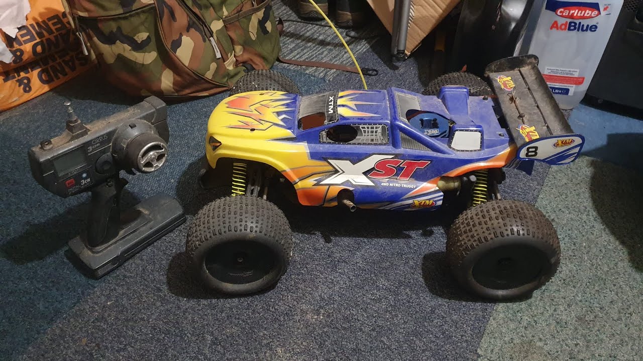 Will It Run ? Nitro XTM XST Stadium Truggy. Sat for 10 years +