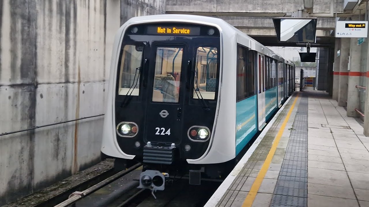 Brand New DLR CAF Stock Trains coming in/out of Stratford International Units 201 & 224