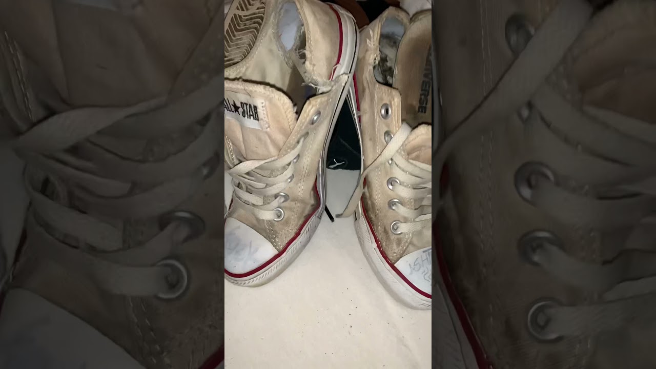 completely worn out girls converse sneakers for the trash can