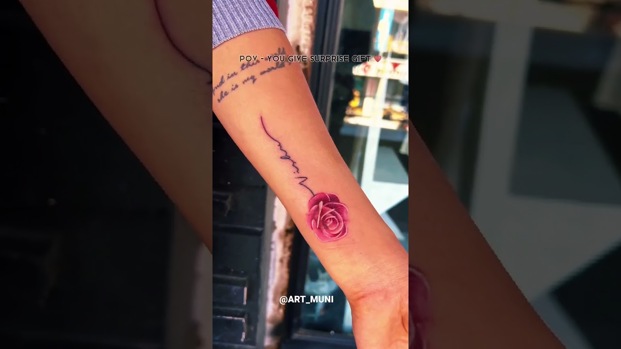 Small customized rose tattoo 