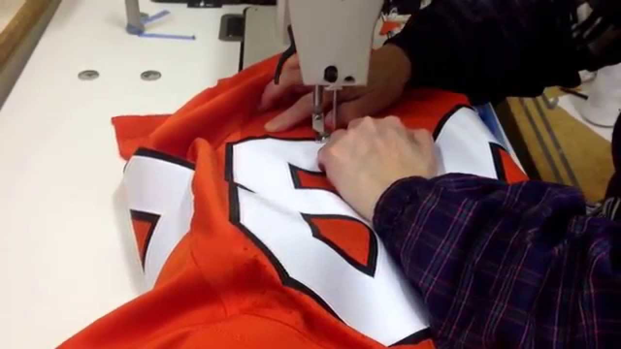 Pro stitched name and number with tackle twill. The same the pro athletes wear!