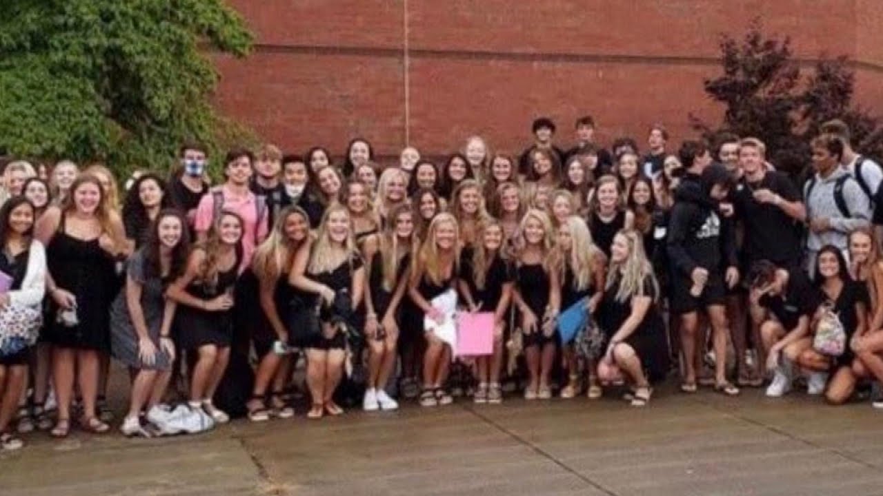 COVID-19 Surge at Georgia School After Mask-less Group Photo