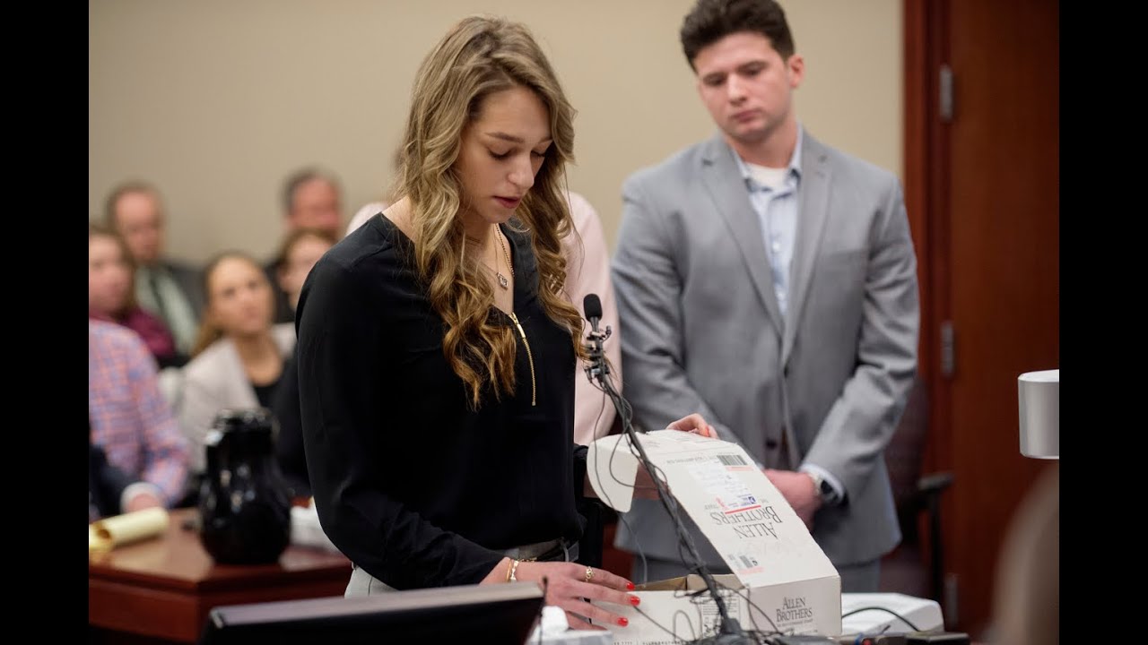 Isabell Hutchins opens Olympic box from Larry Nassar