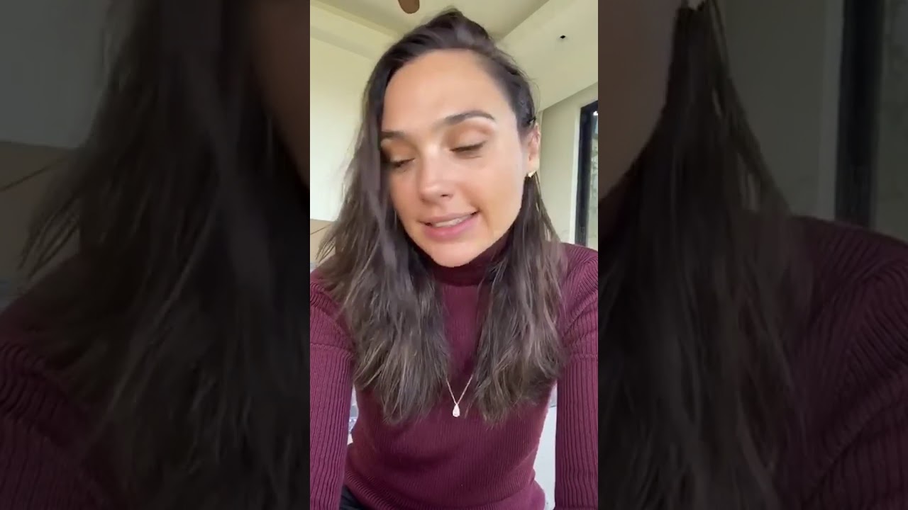 Gal Gadot singing Imagine with other stars