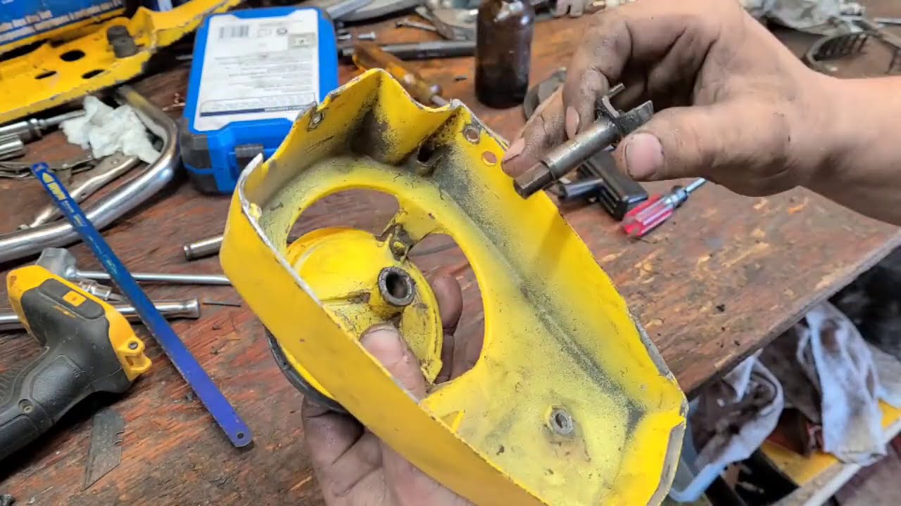 FNS: rewinding a McCulloch recoil spring..
