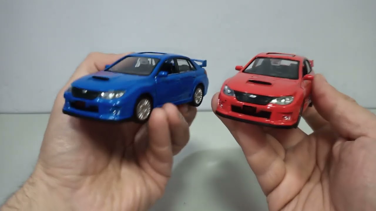SUBARU WRX STI металлическая модель 1:34 фирма RMZ City.