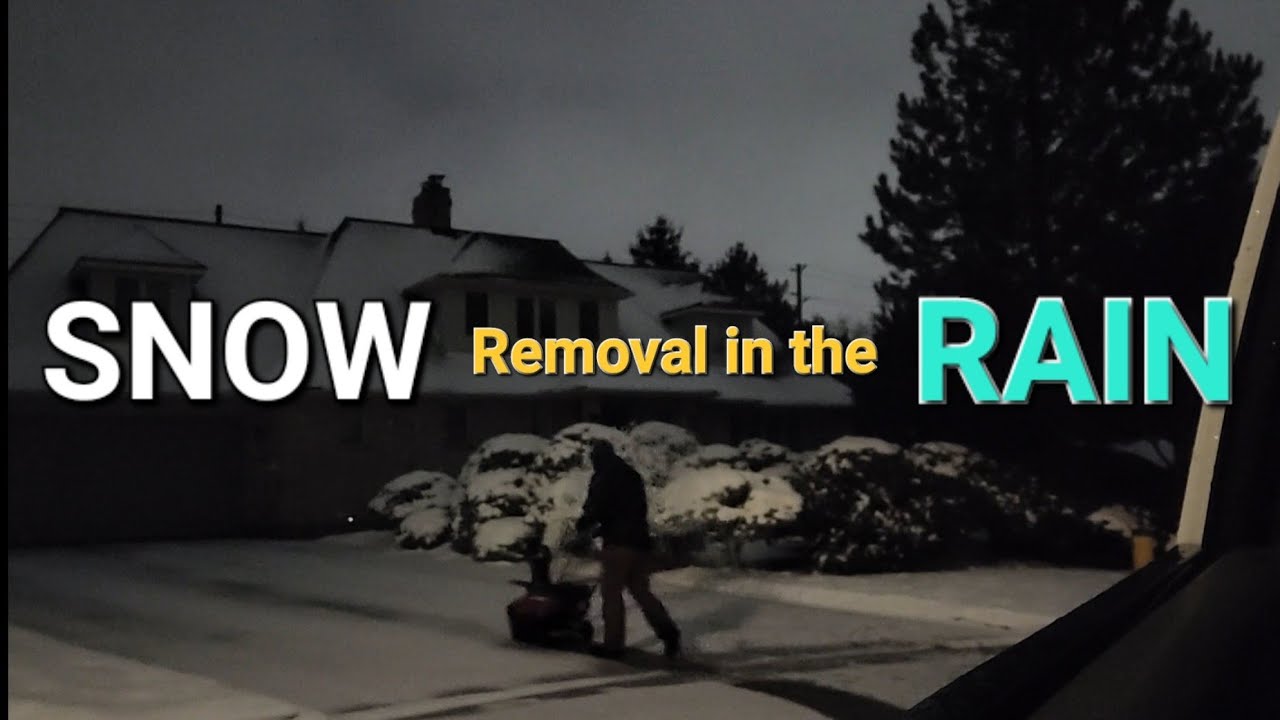 Shoveling snow in the rain. Snow removal business