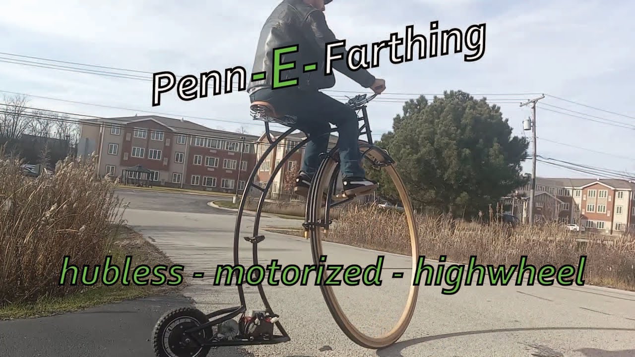 Изготовленный на заказ моторизованный электровелосипед Penn-E-Farthing с высоким колесом без втул...