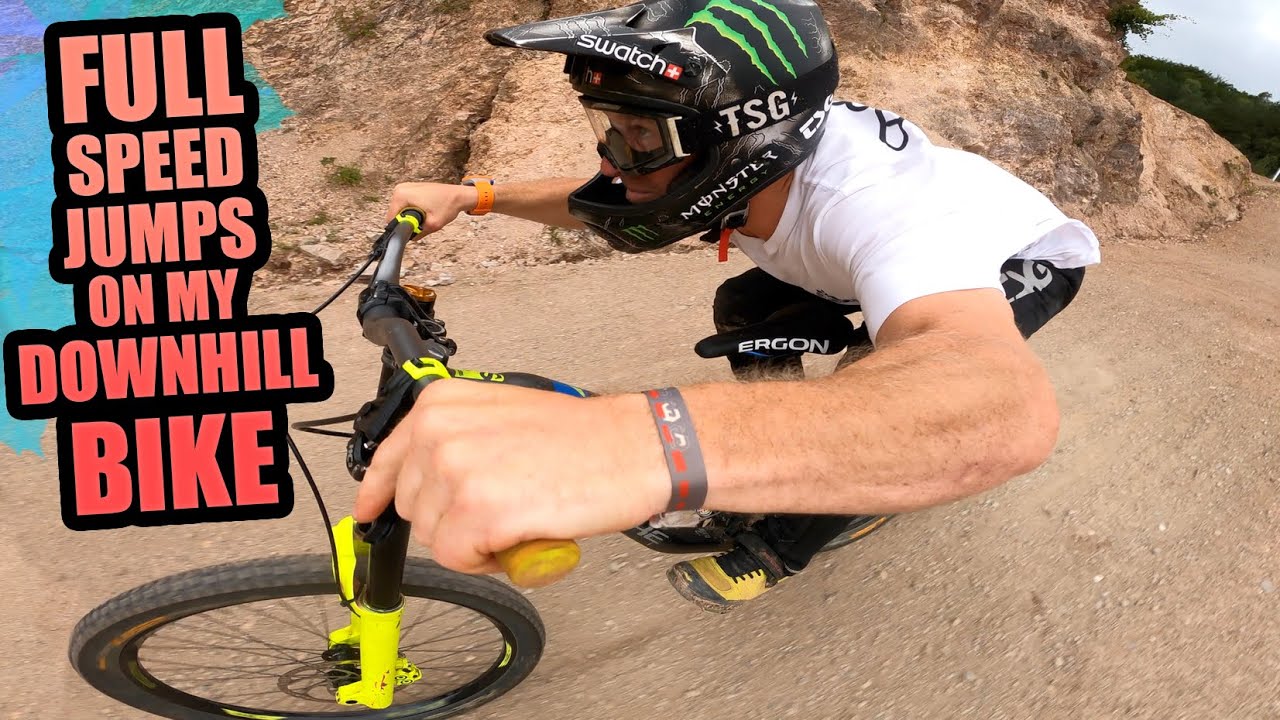 RIDING HUGE FULL SPEED JUMPS ON MY DOWNHILL BIKE - AUDI NINES IS INSANE!