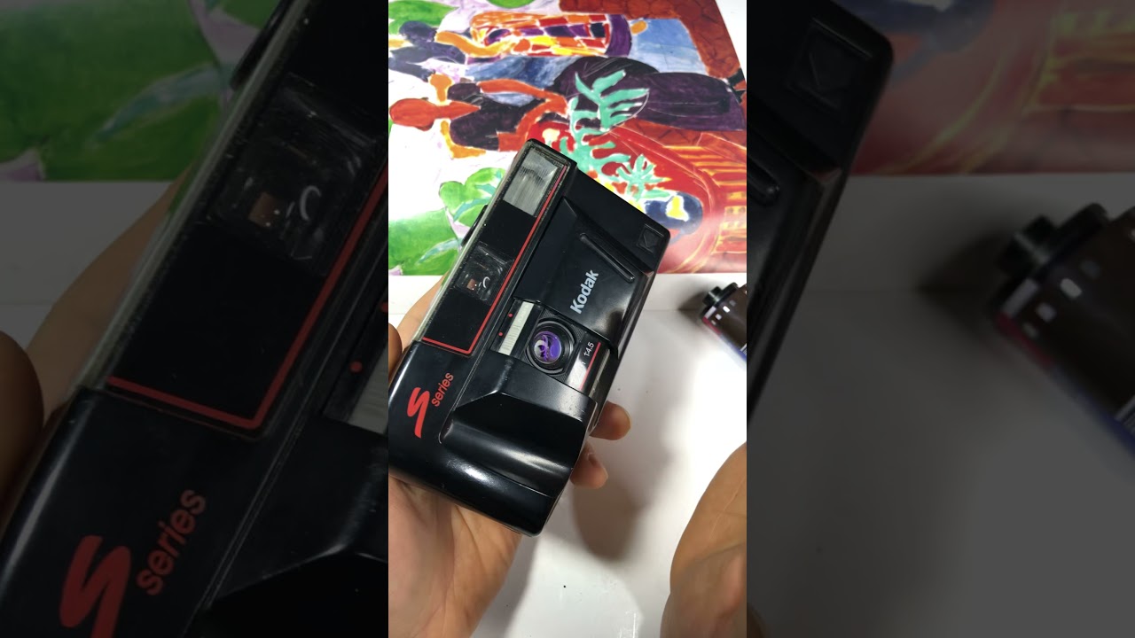 Kodak s100 ef f4.5 toy camera with flash how to load a film and use