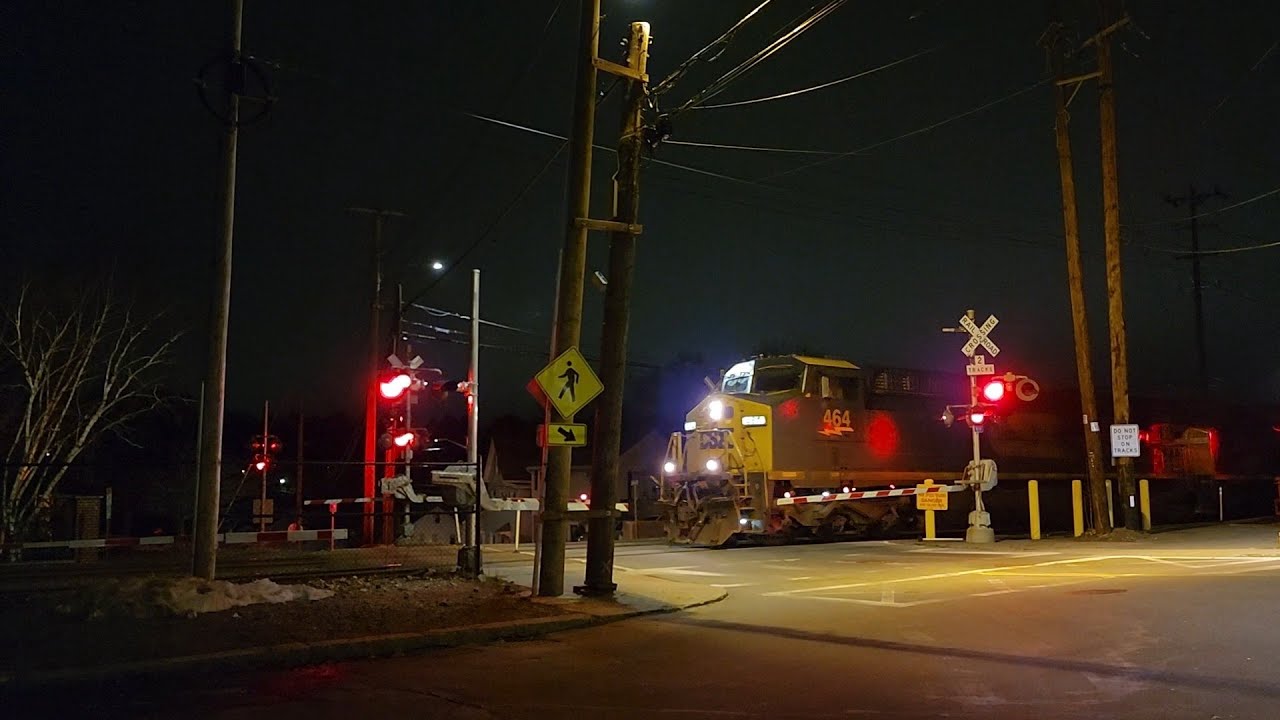CSX M427 464 473 and 466 in Andover MA  stops to wait for the MBTA 