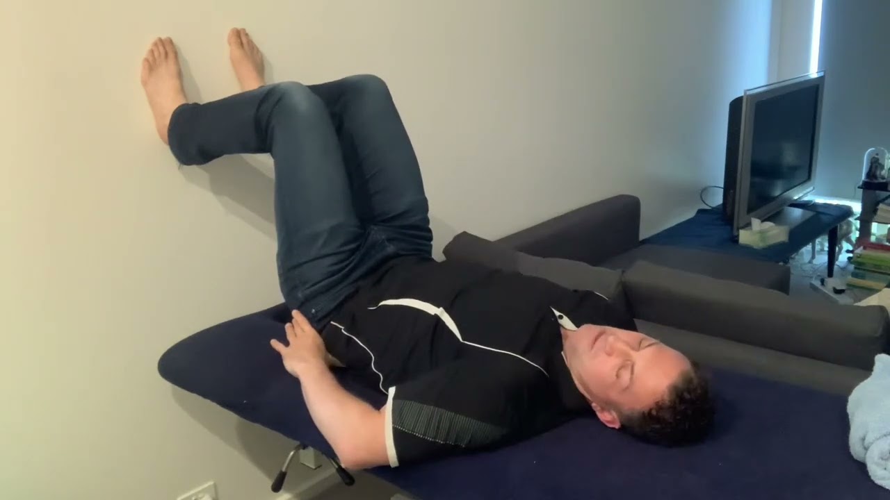 PRI: hemi bridge with heel taps. Unwind the Left AIC pattern. Left hamstring engagement. Stage 1.