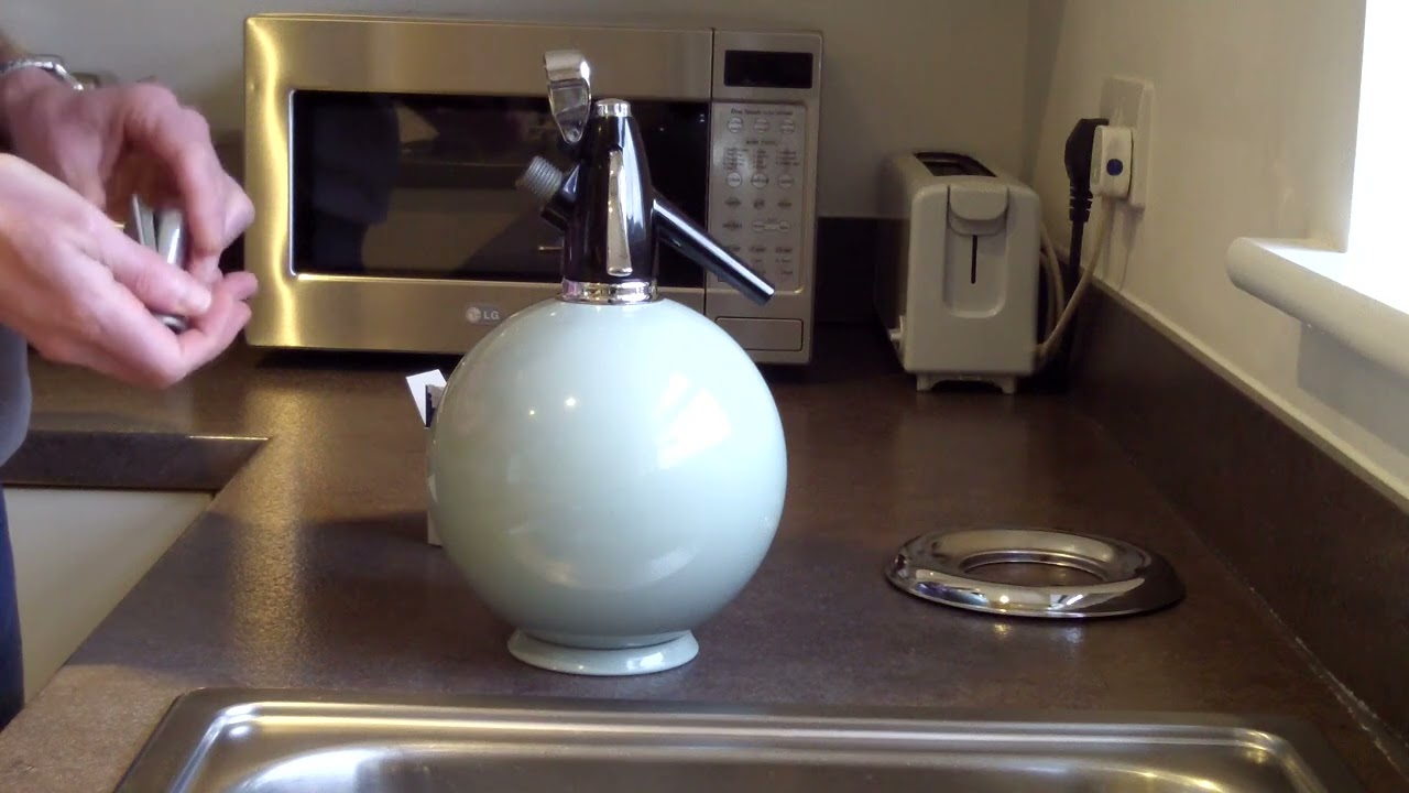Sparklets Globemaster Soda Siphon in use