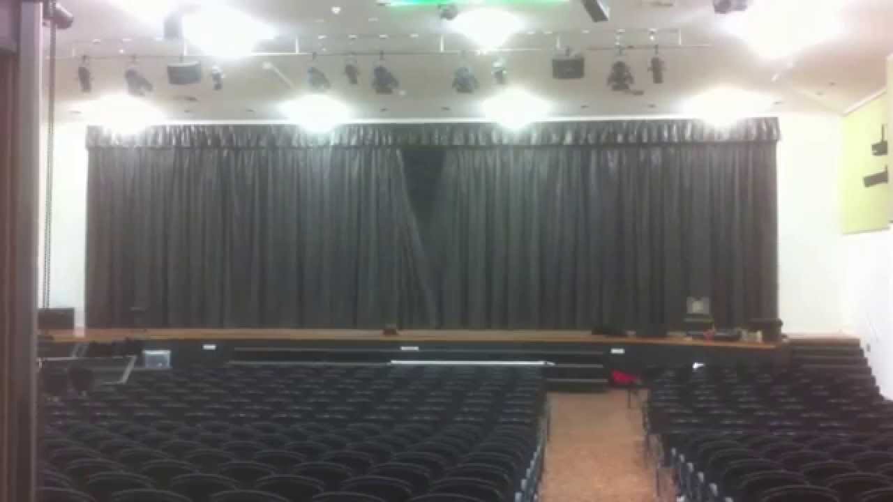 Motorised front-of-house curtain in motion