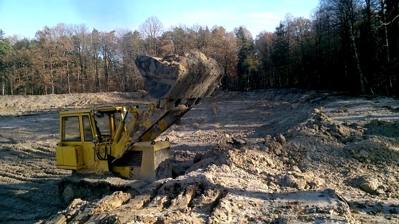 Praca w stawie Hanomag D600c. Kopanie stawu rybnego.