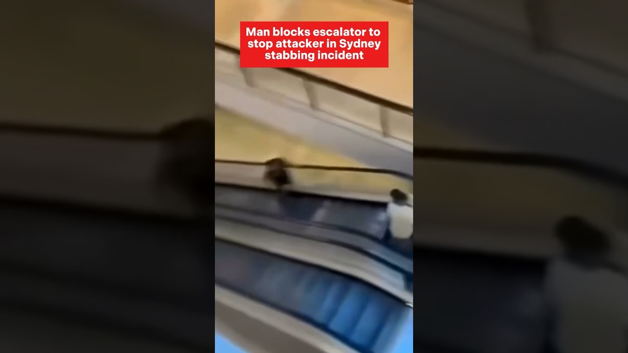 Man blocks escalator to stop attacker in Sydney stabbing rampage #shorts