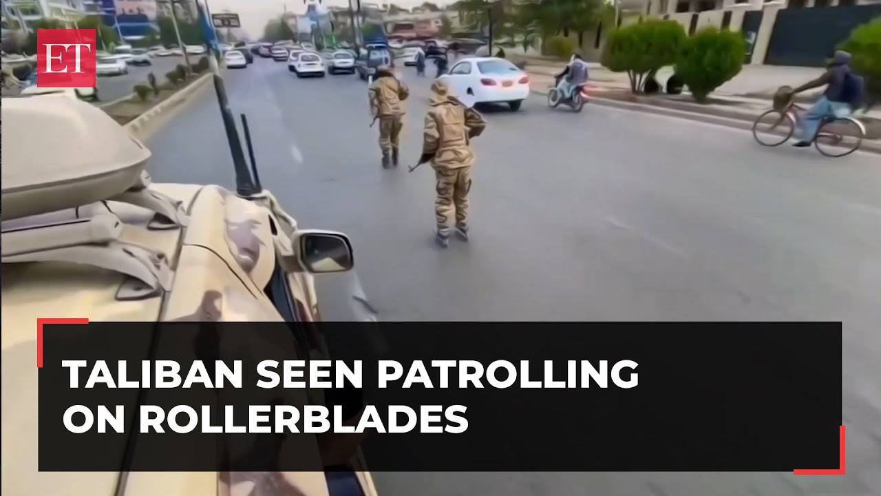 Taliban seen patrolling Kabul streets on rollerblades armed with AK-47s