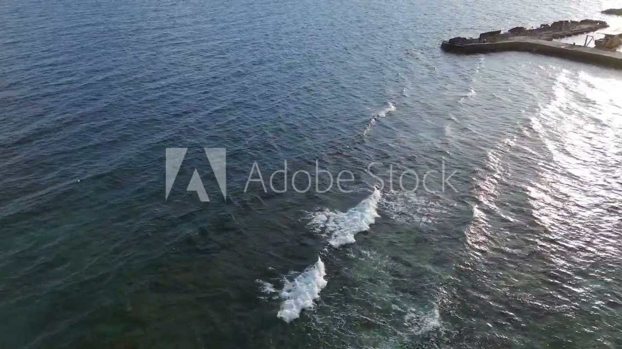 Aerial view of dark blue ocean waves
