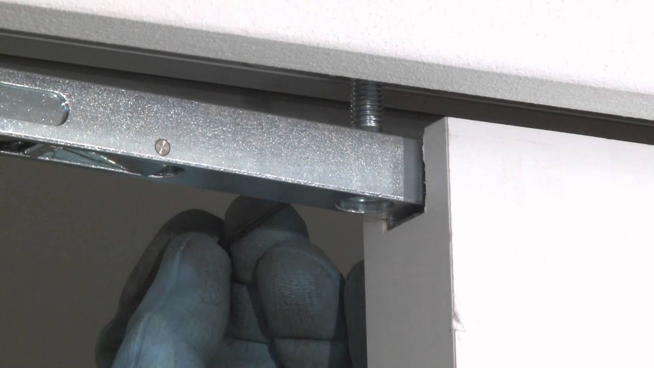 Installing the door on an Eclisse Syntesis Line pocket door system