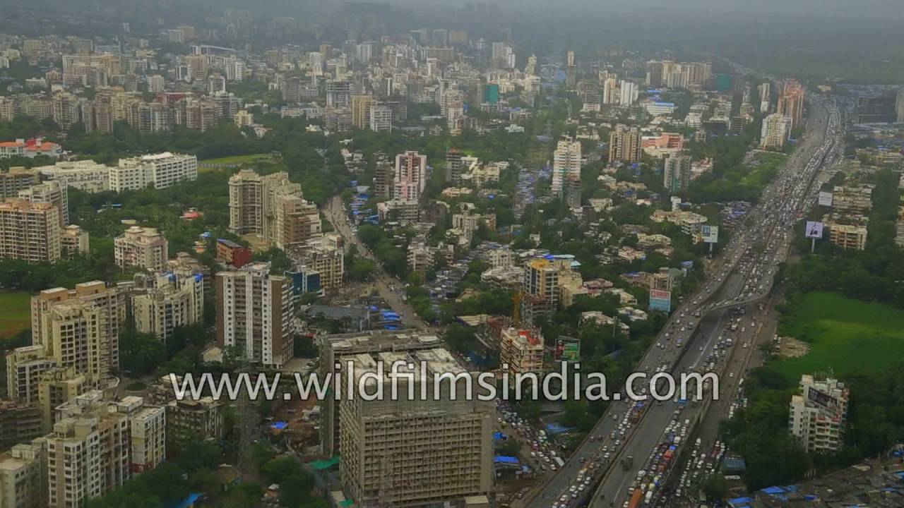Flying over Mumbai city, mangroves and the Arabian sea coast