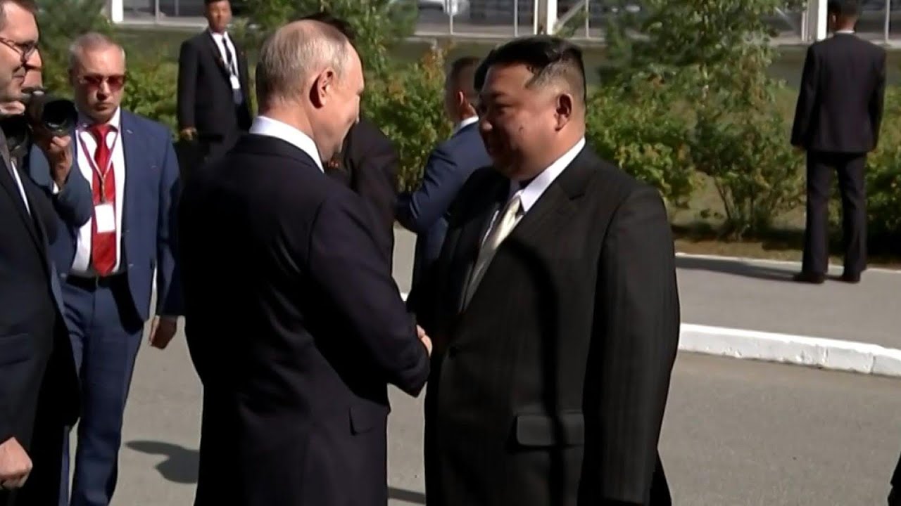 Putin, Kim shake hands at Russian spaceport | AFP