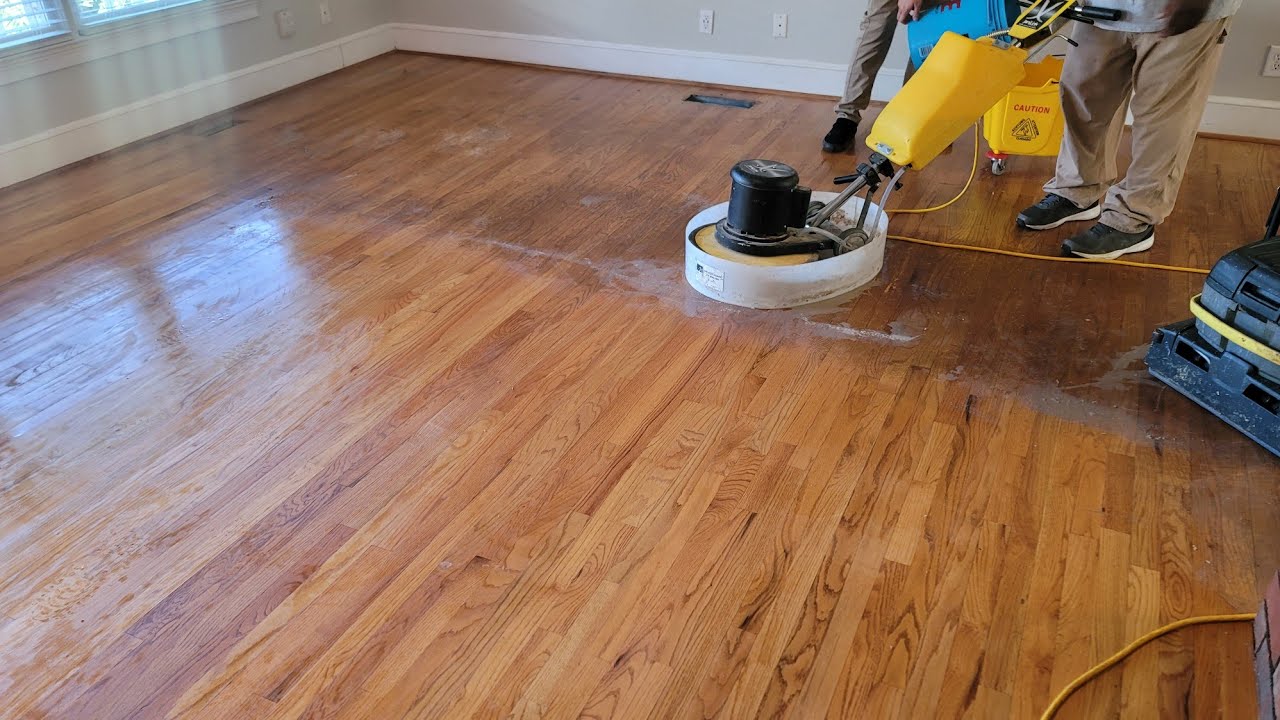 We made these 26 year old hardwood floors look brand new after removing the wax build-up