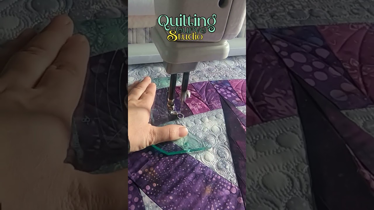 arch quiled border on a longarm machine 