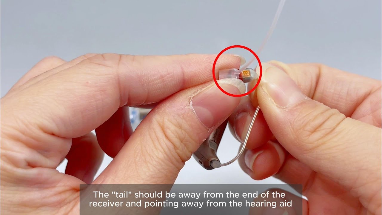 How to put on a retention cord on Oticon RIC hearing aids