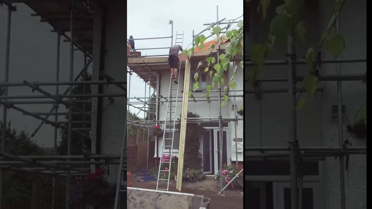 Sliding down a ladder