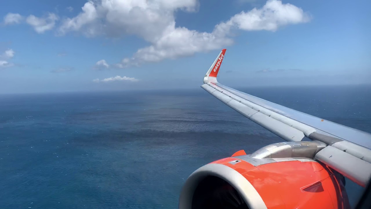 Easy Jet Airbus A320 NEO aborted windy landing and go round at Santorini Thira airport May 2019