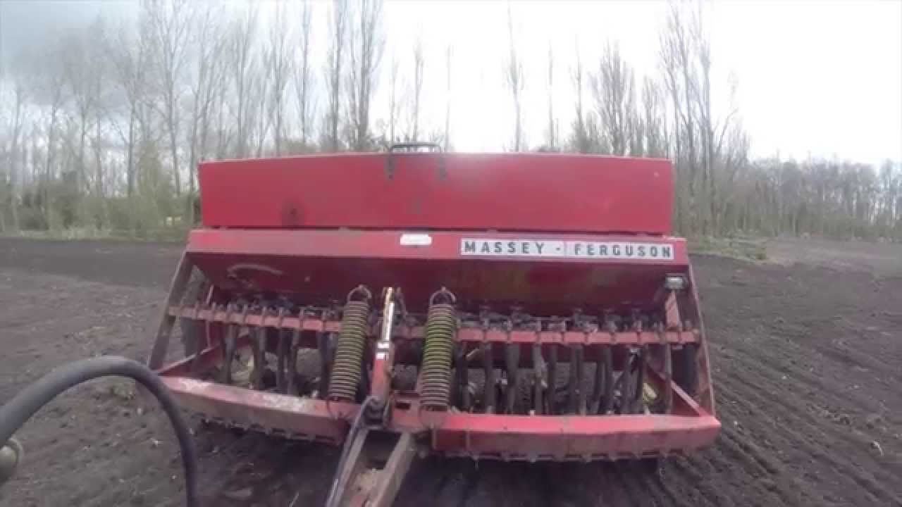 Massey Ferguson 135 with Massey Ferguson 30 drill