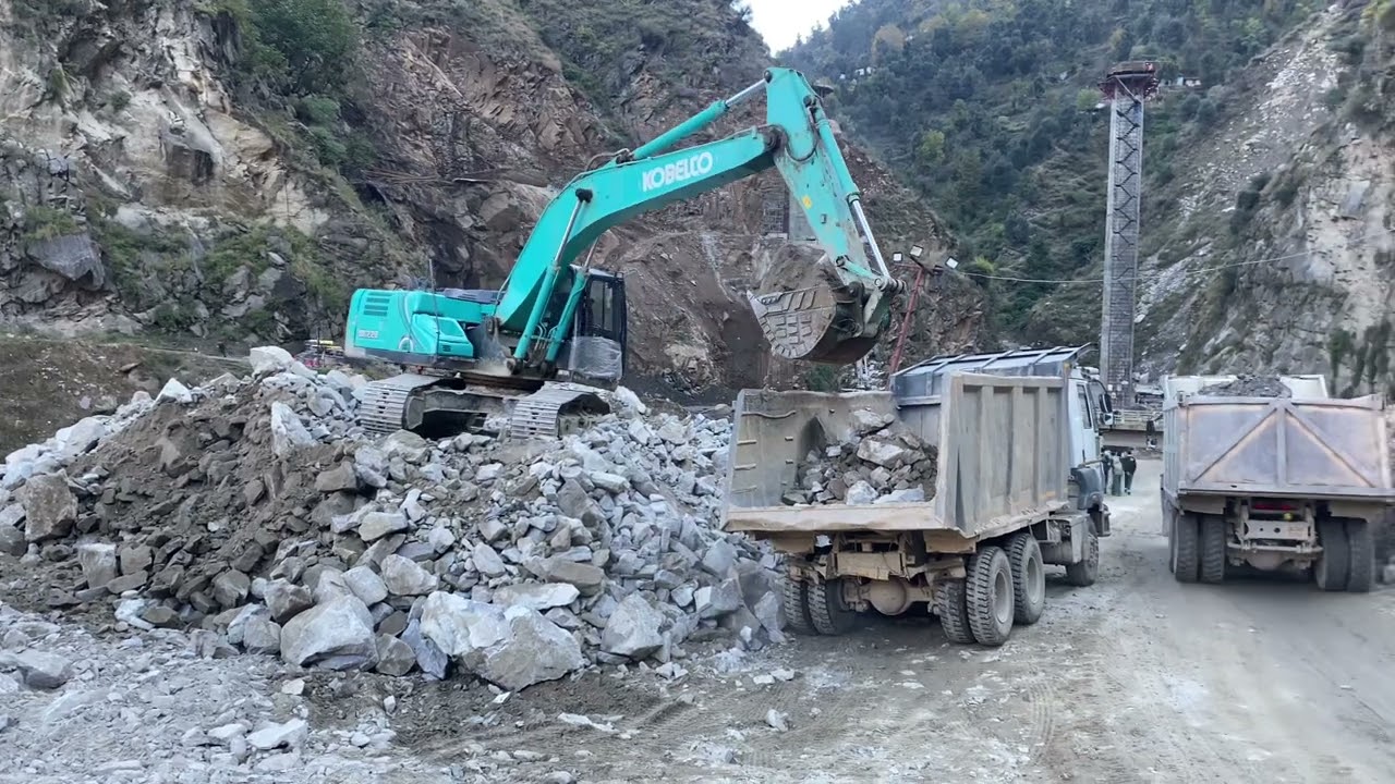 kobelco sk 220 loading stone in tata dampers….