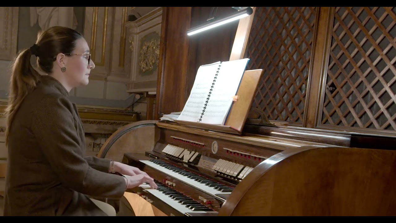 Dr Fiorella Fenech Vella playing the organ at St Paul's Basilica, Rabat Malta