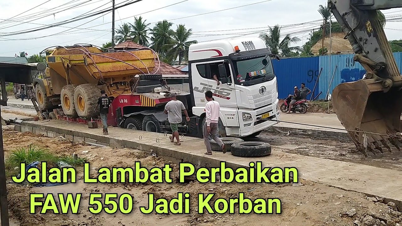 Evakuasi Tersulit Truk FAW 550 JH6 Muatan ADT yang Terjebak Digalian Drainase