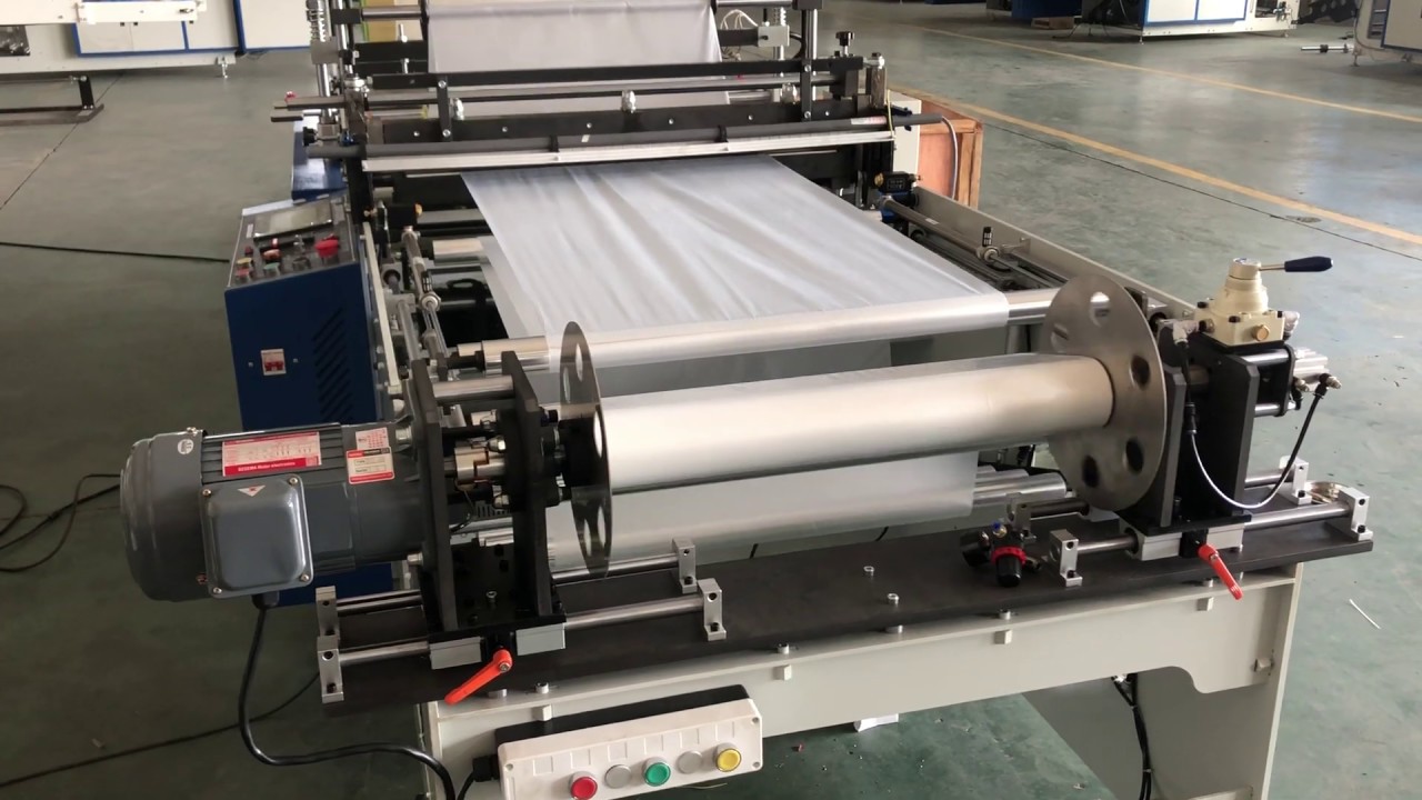 Semi-auto rolling bag making machine