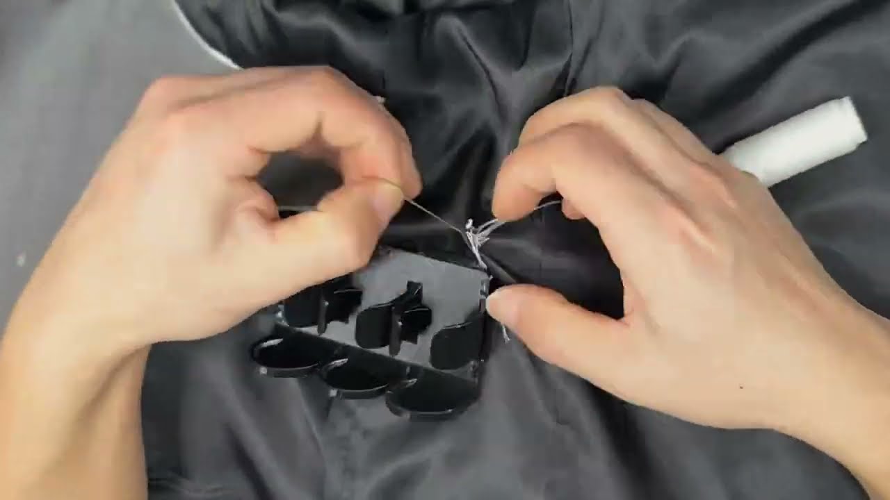 Multi-Slot Thumb Tip Holder