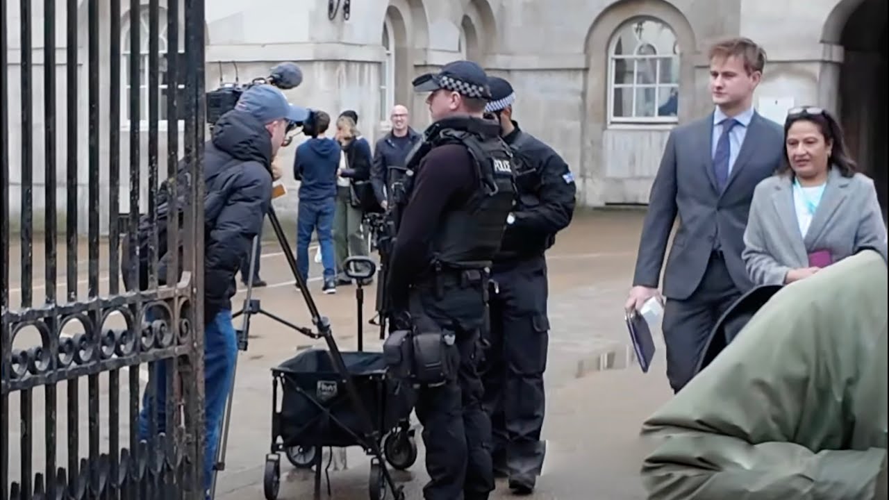 SORRY!! THIS IS. NOT ALLOWED!! Armed Officers confronts him!!