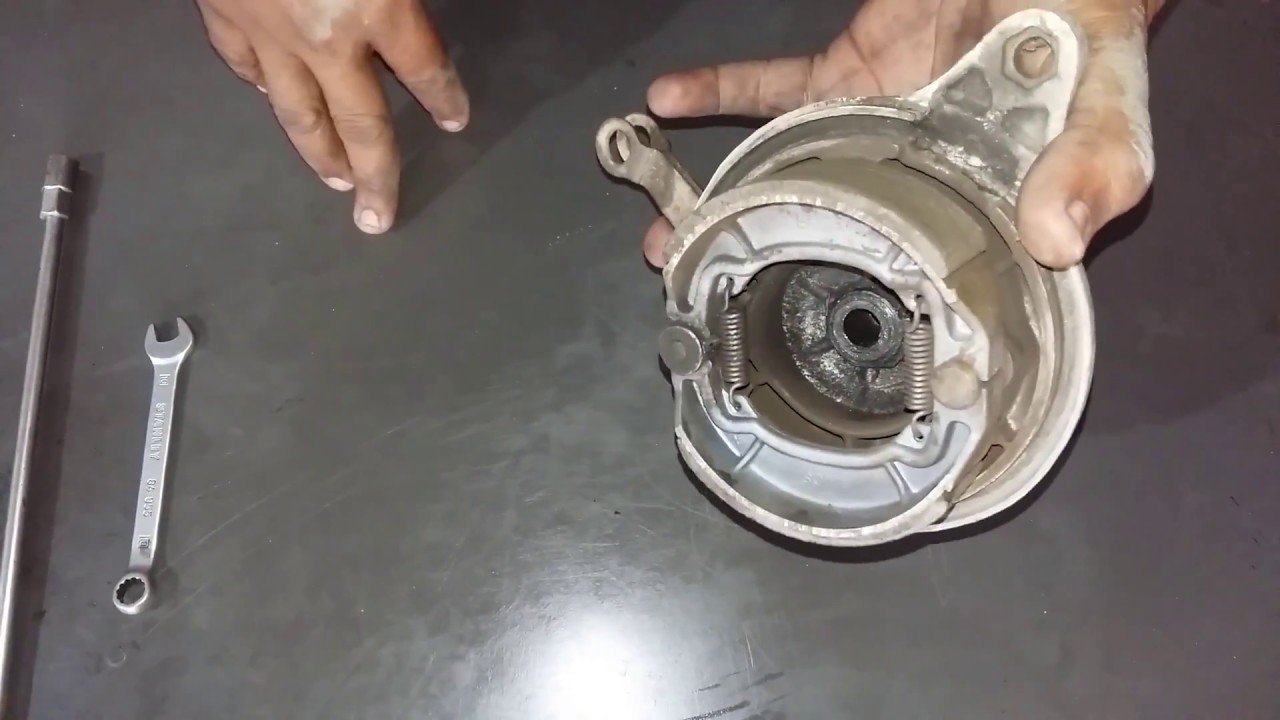 como evitar  q  tu moto    se  quede frenada     Reparacion   de  bandas tracera