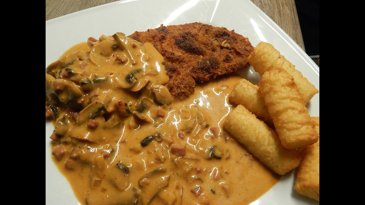 Jägerschnitzel oder panierte Schnitzel aus dem Ofen mit Pilzrahmsoße