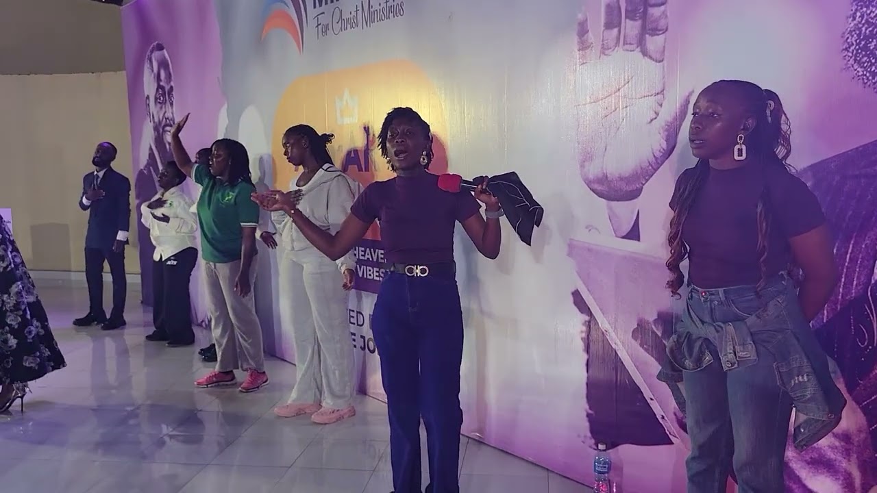 Nina Roz Ugandas great artist in a worship session with adora band 